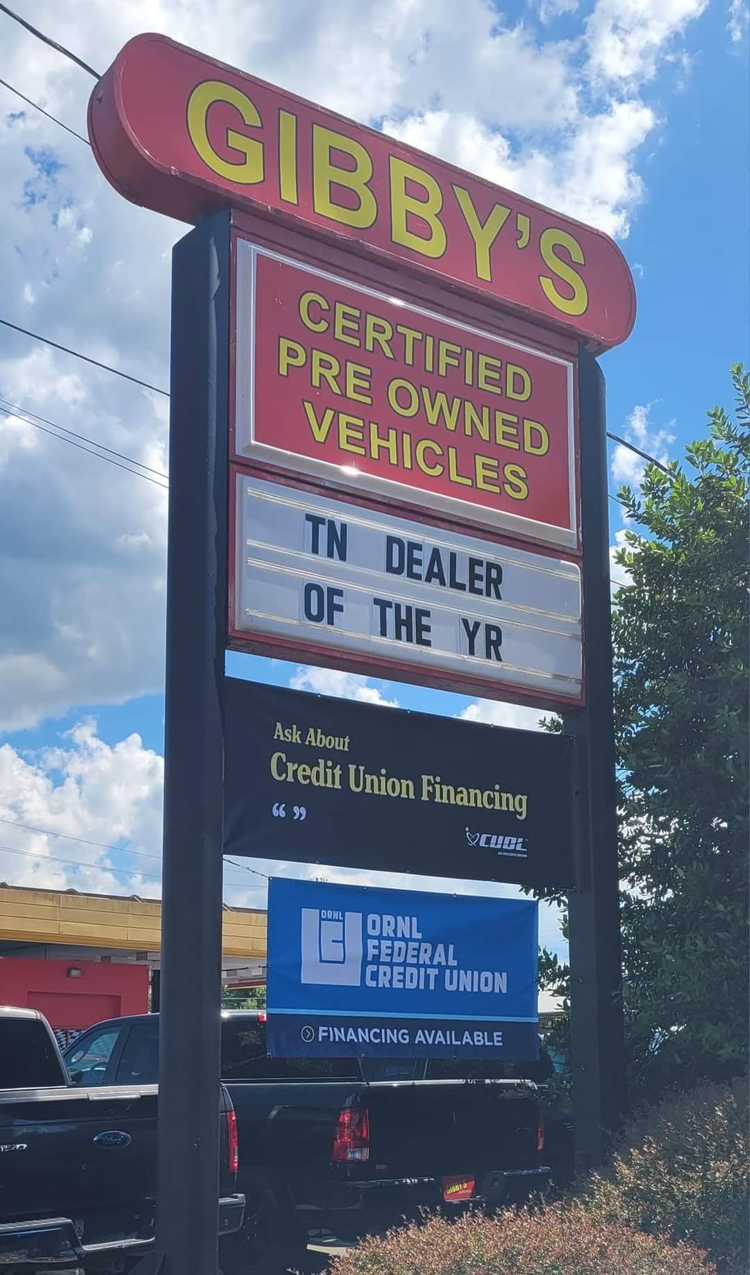 Gibby's sign recognizing Tennessee Dealer of the Year during Eric's dealership years